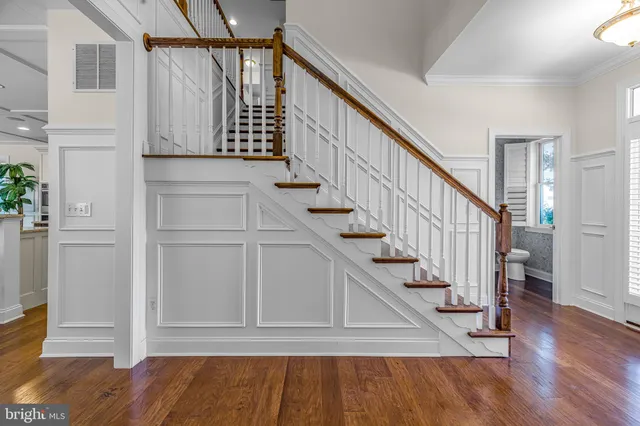 a kitchen with stainless steel appliances a refrigerator sink and cabinets