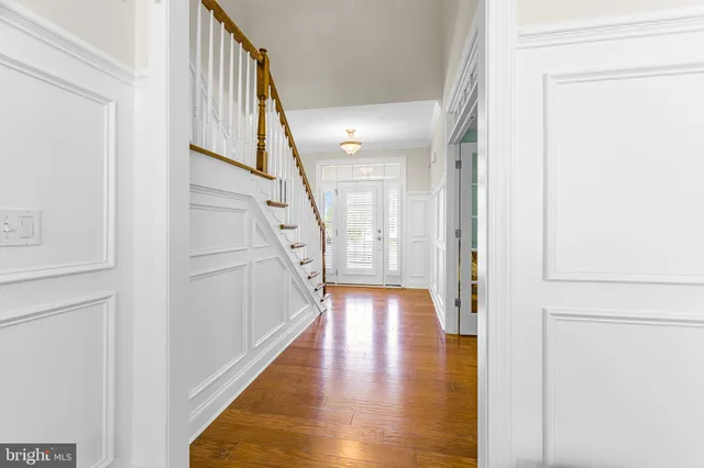 a kitchen with lots of counter top space and stainless steel appliances