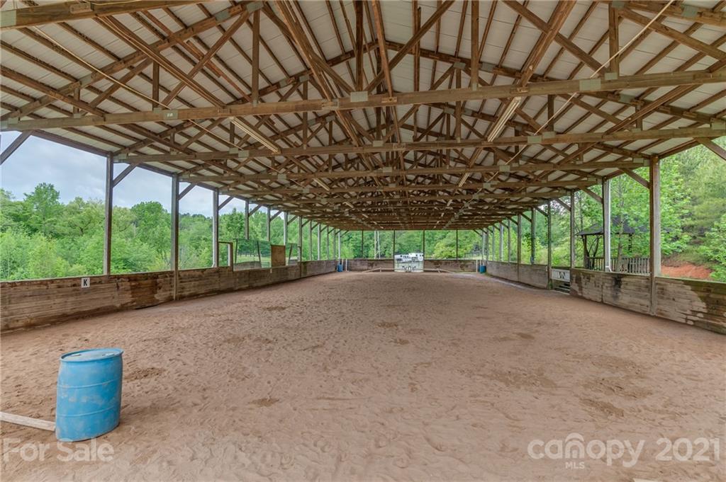 4733 Hunting Country Road Tryon, NC 28782 - Photo 12 of 48 a view of a backyard with large trees