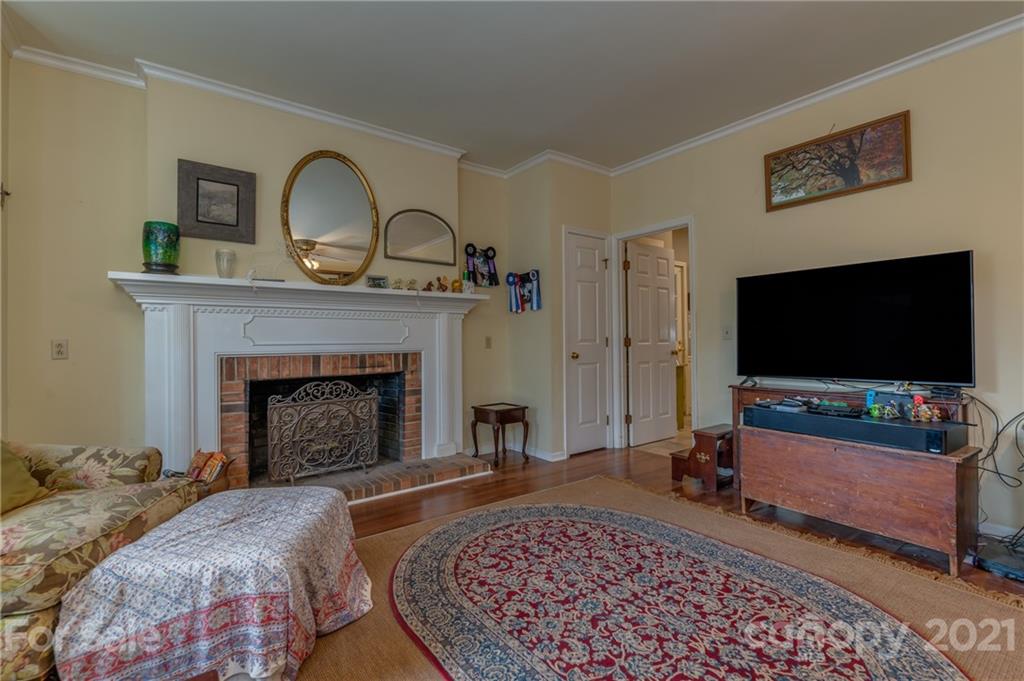 4733 Hunting Country Road Tryon, NC 28782 - Photo 20 of 48 a living room with furniture and a fireplace