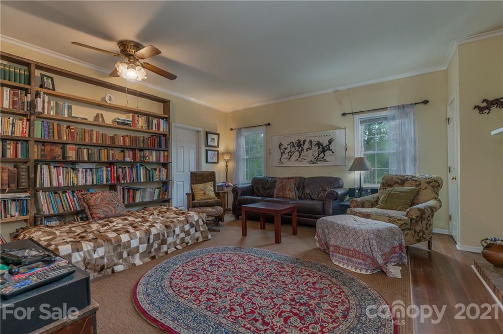 4733 Hunting Country Road Tryon, NC 28782 - Photo 21 of 48 a living room with furniture and a rug
