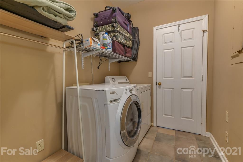 4733 Hunting Country Road Tryon, NC 28782 - Photo 24 of 48 a utility room with dryer and washer