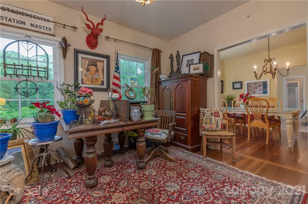 4733 Hunting Country Road Tryon, NC 28782 - Photo 27 of 48 a view of a dining room with furniture window and outside view