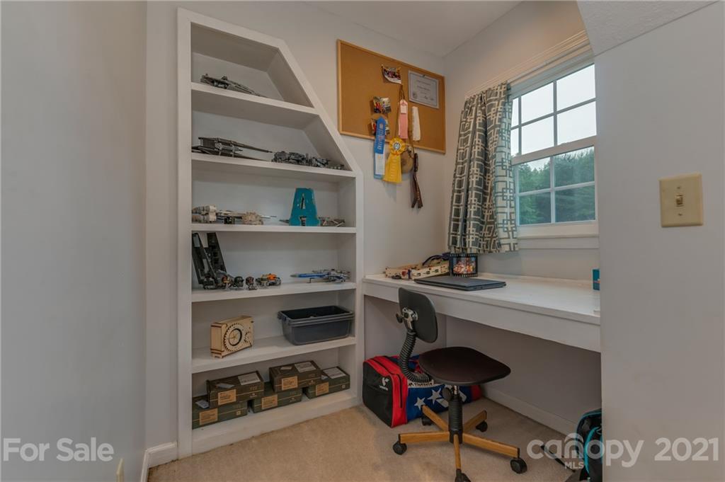 4733 Hunting Country Road Tryon, NC 28782 - Photo 34 of 48 a view of a workspace with furniture and a window