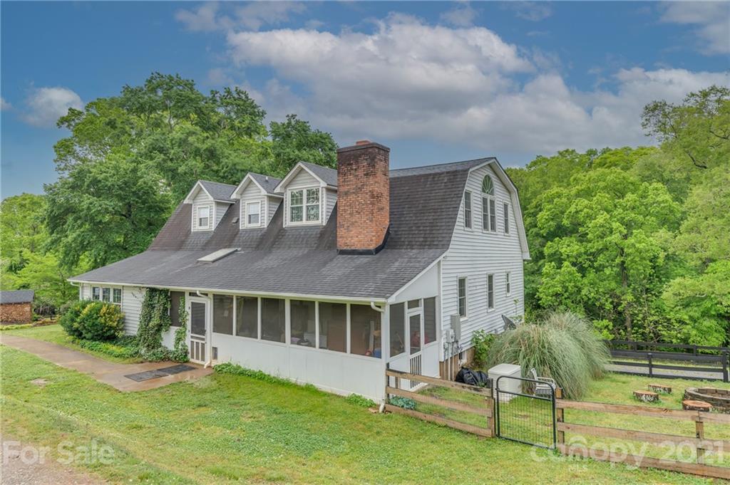 4733 Hunting Country Road Tryon, NC 28782 - Photo 40 of 48 a front view of a house with a yard