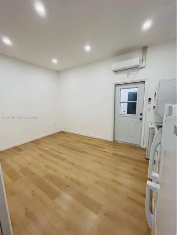 a bathroom with a toilet sink and shower