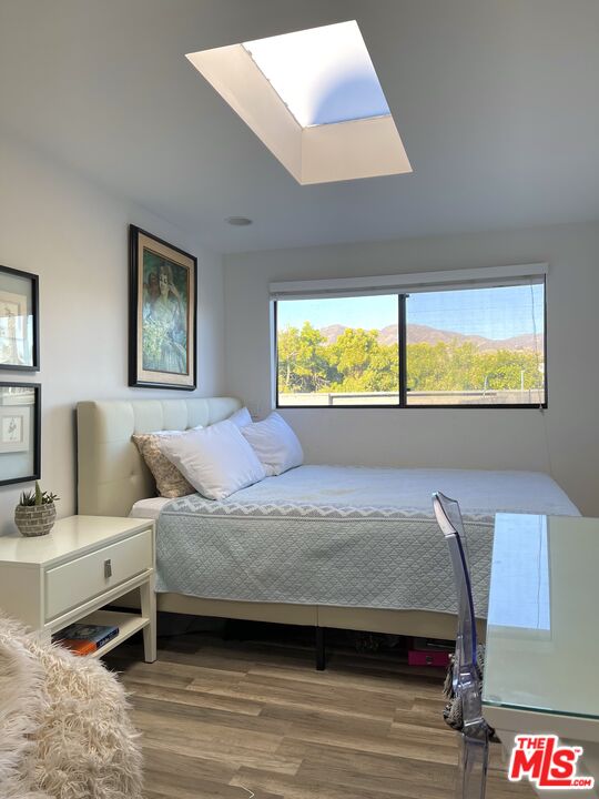 29500 Heathercliff Road, Unit 260 Malibu, CA 90265 - Photo 13 of 23 a bedroom with a bed and window
