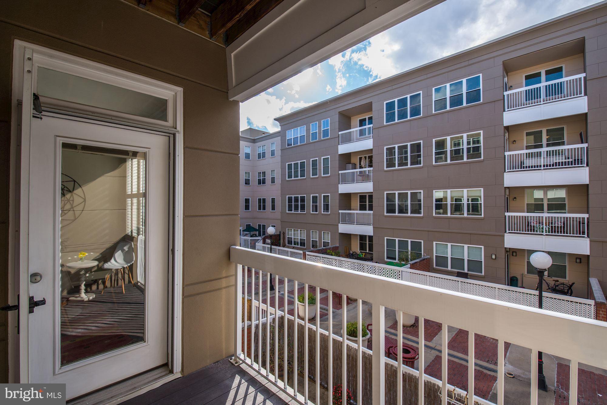 2004 11th Street Northwest, Unit 231 Washington, DC 20009 - Photo 14 of 26 Access to private balcony off dining/living area