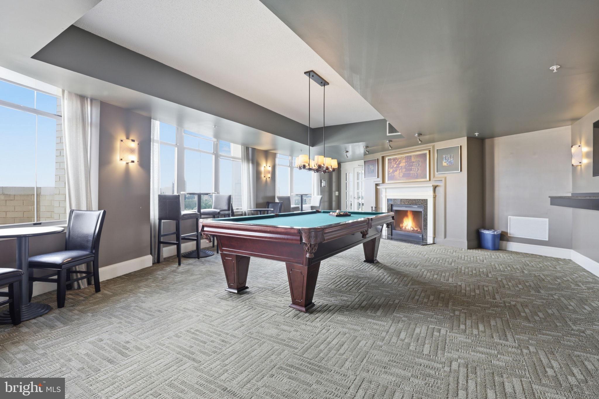 11800 Sunset Hills Road, Unit 218 Reston, VA 20190 - Photo 32 of 38 a room with pool table and windows