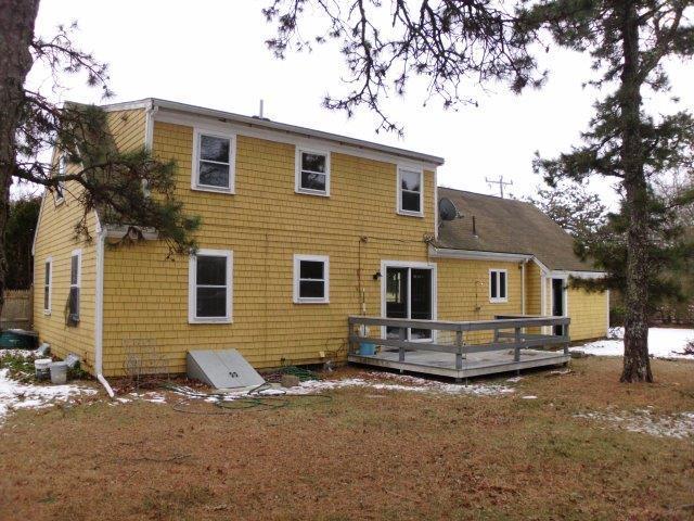 7 Coach Light Road Centerville, MA 02632 - Photo 20 of 22 a view of a house with a yard