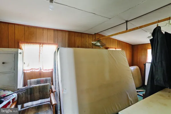 a utility room with shower and windows