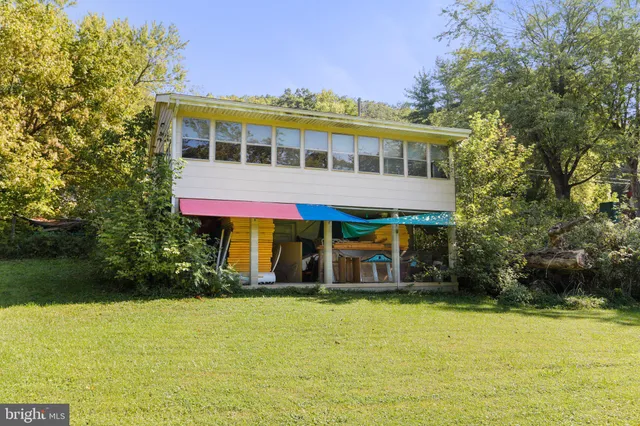 a house view with a garden space