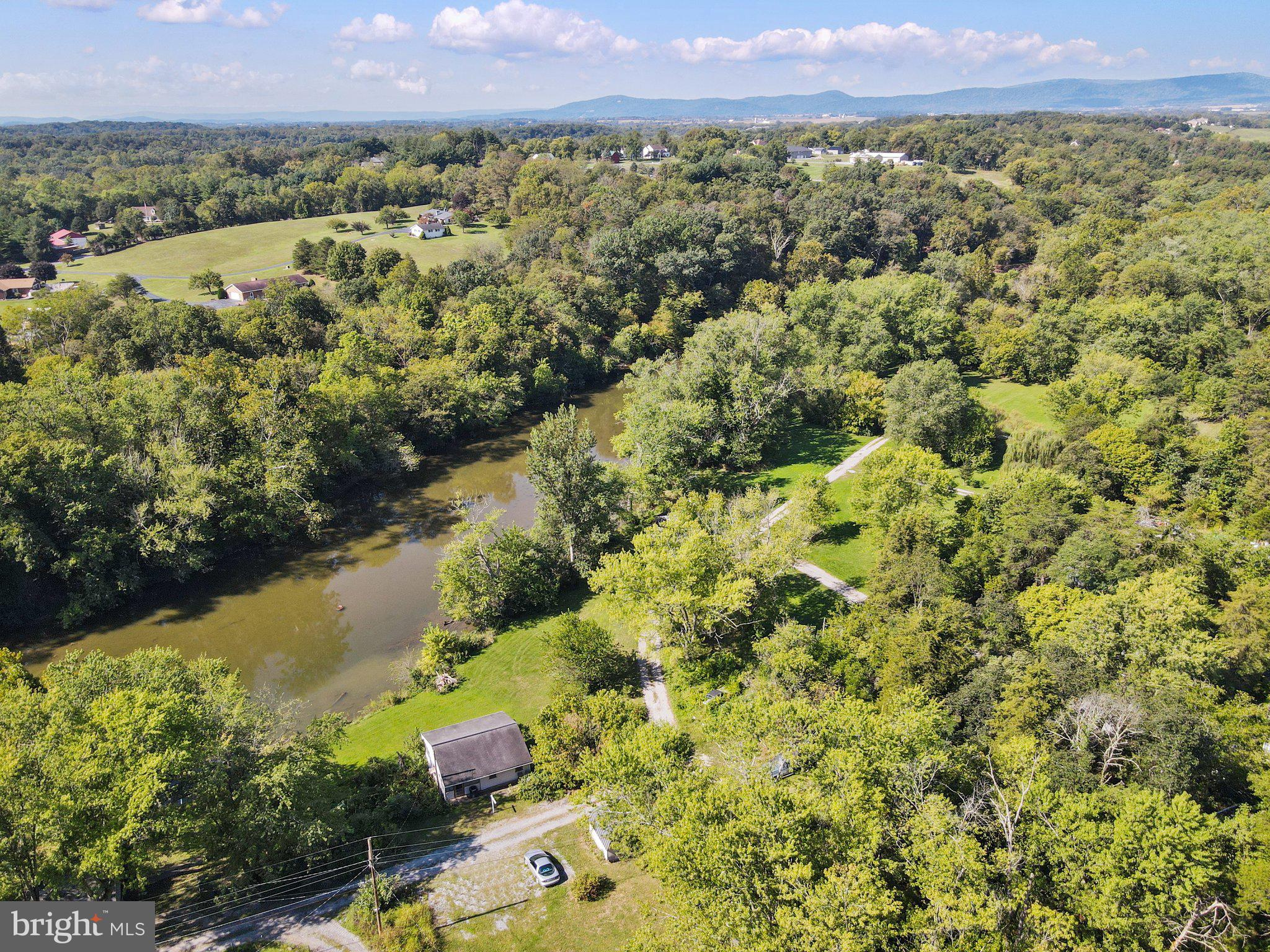 13726 Hopps Landing Road Hagerstown, MD 21740 - Photo 2 of 28 a view of a city with mountains in the background