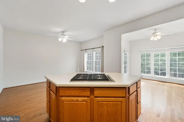 a view of a balcony with wooden floor