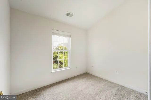 a bathroom with a sink mirror toilet and bathtub