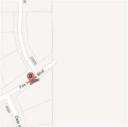 a bathroom with a sink and a shower curtain