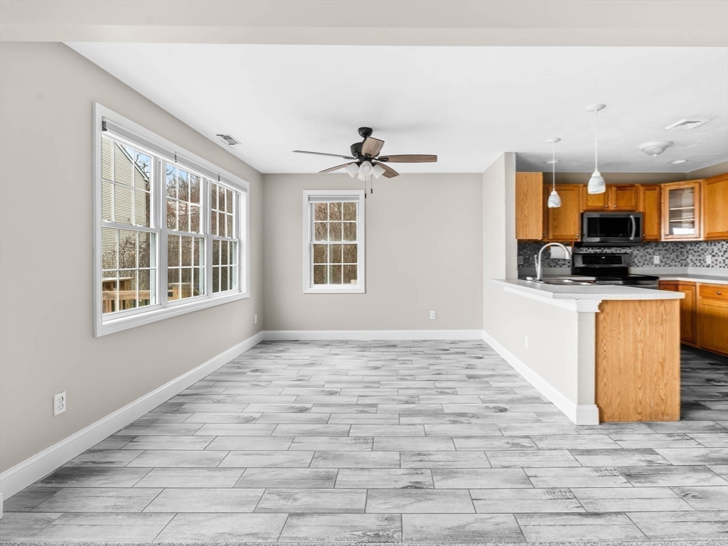 20 Angela Rose Lane Worcester, MA 01604 - Photo 19 of 35 a view of a kitchen with microwave and cabinets
