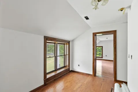 an empty room with windows