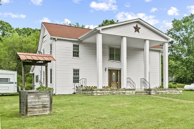 a front view of house with yard