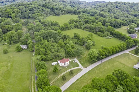 a view of a forest from a balcony