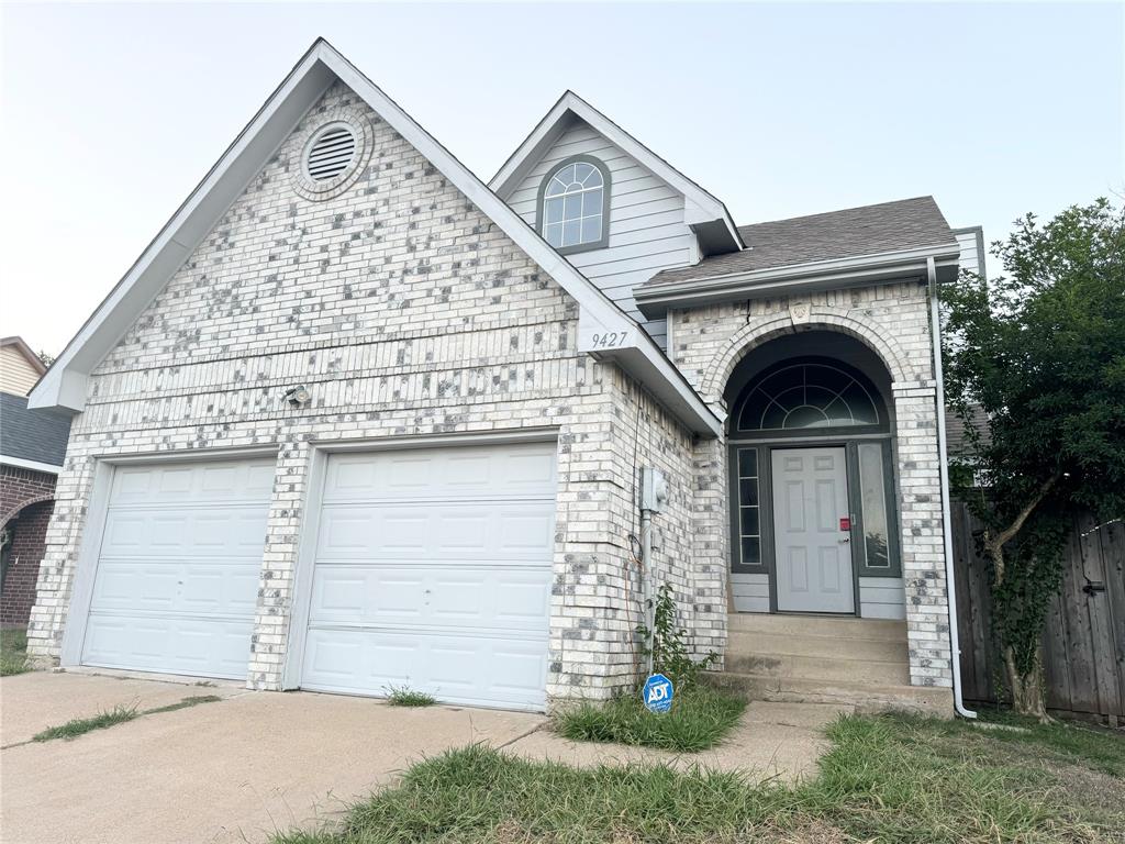 9427 Gossage Lane Dallas, TX 75227 - Photo 1 of 1 a front view of a house with garden