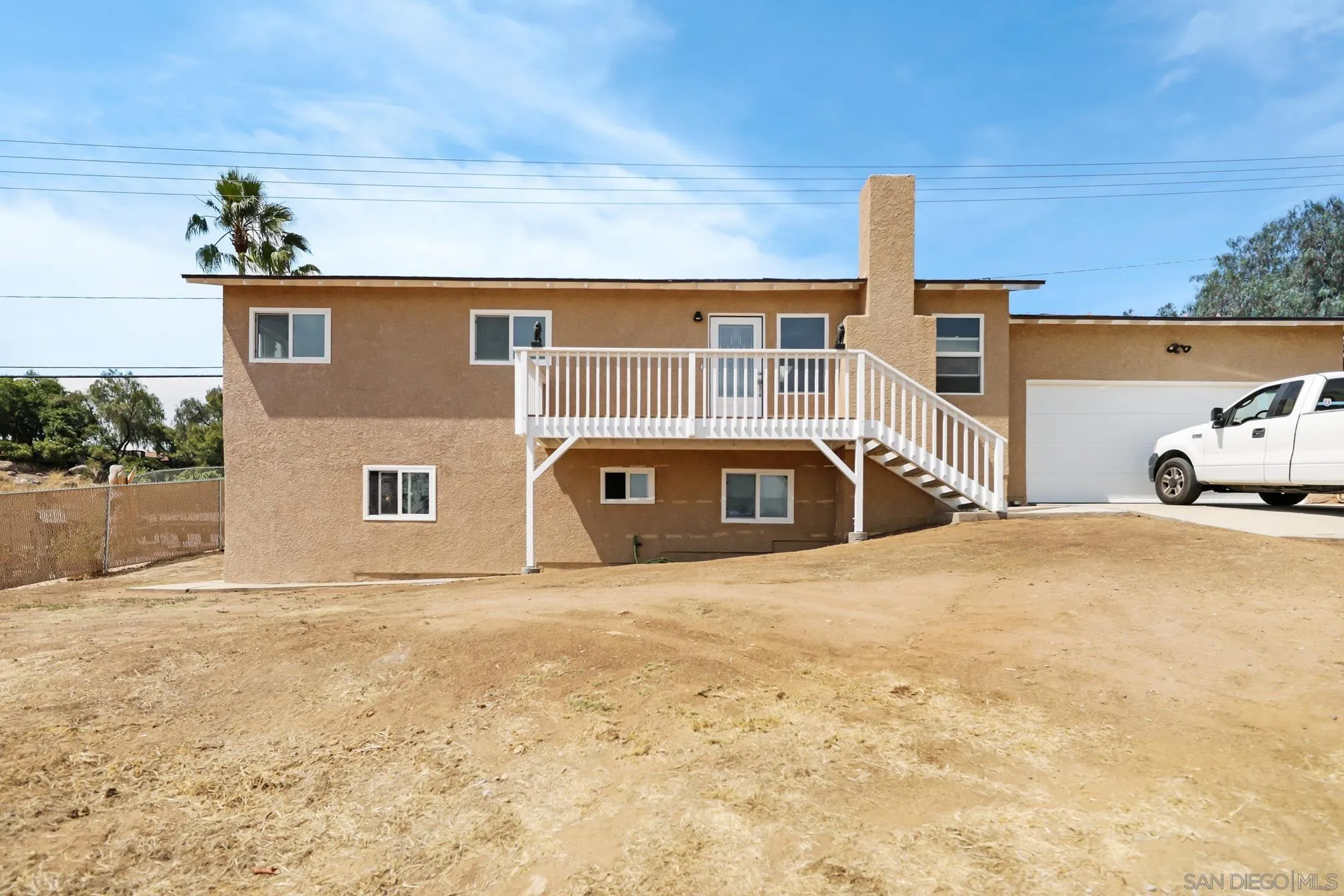 14668 Lyons Valley Road Jamul, CA 91935 - Photo 8 of 44 a front view of a house with a yard