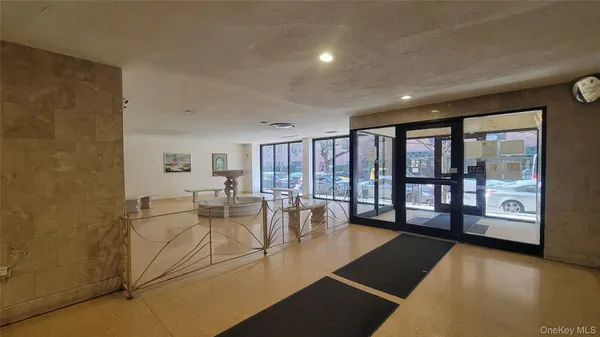 a view of a living room with furniture