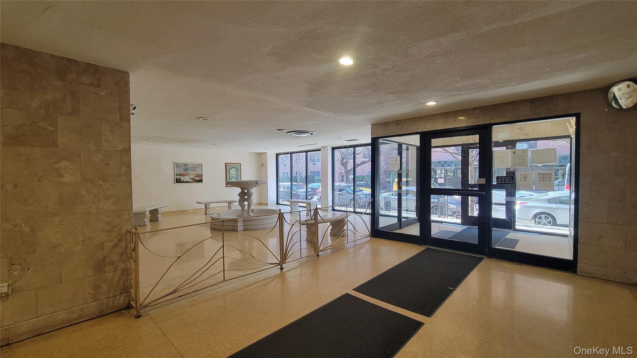 99-06 58th Avenue, Unit 2F Queens, NY 11368 - Photo 6 of 24 a view of a living room with furniture