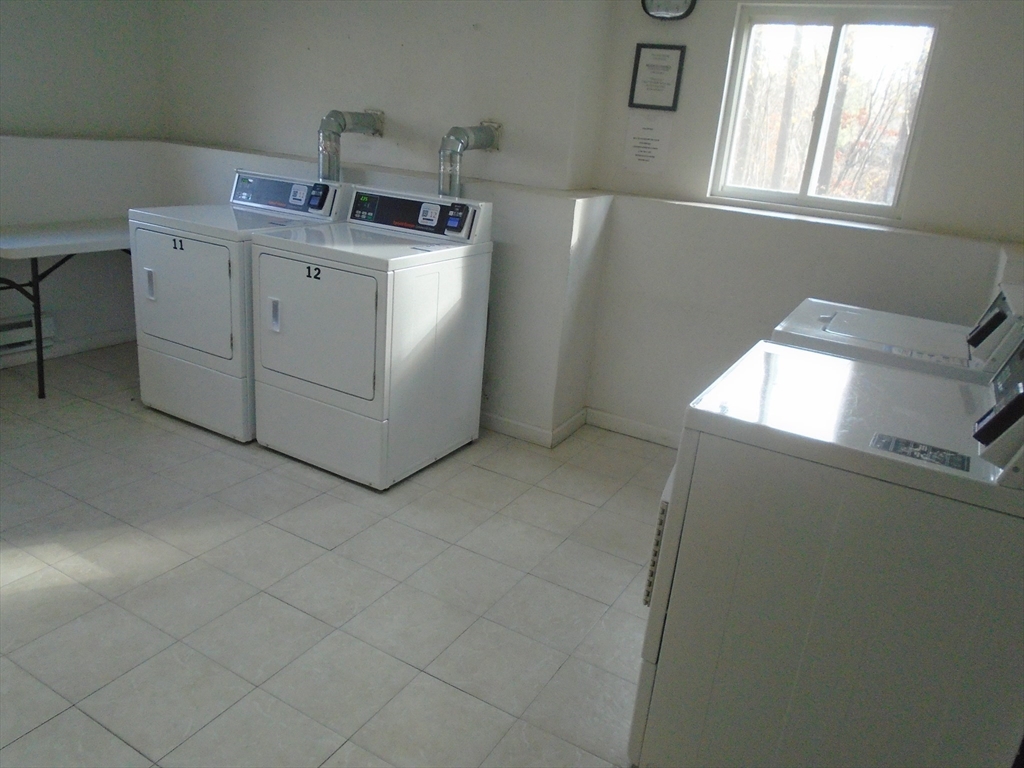 451 School Street, Unit 34 Marshfield, MA 02050 - Photo 16 of 18 a utility room with dryer and washer