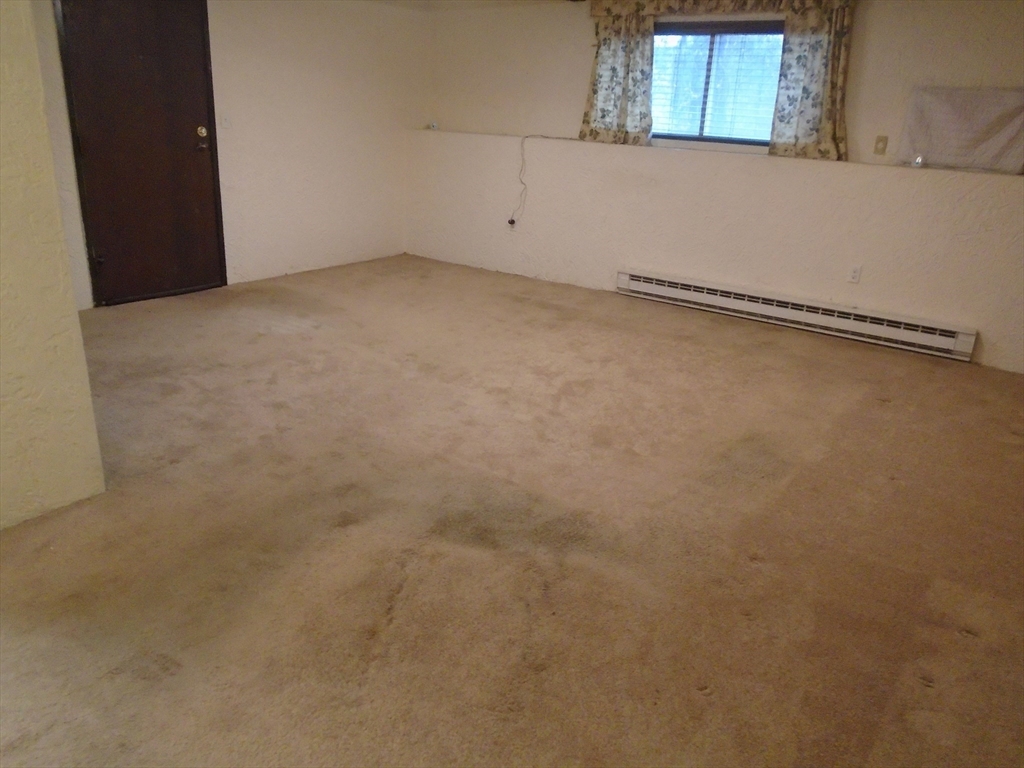 451 School Street, Unit 34 Marshfield, MA 02050 - Photo 5 of 18 a view of a garage