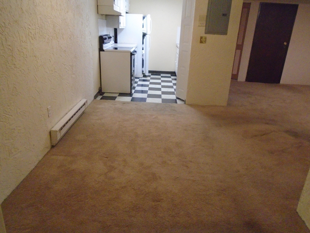 451 School Street, Unit 34 Marshfield, MA 02050 - Photo 8 of 18 a view of a storage & utility room with a window