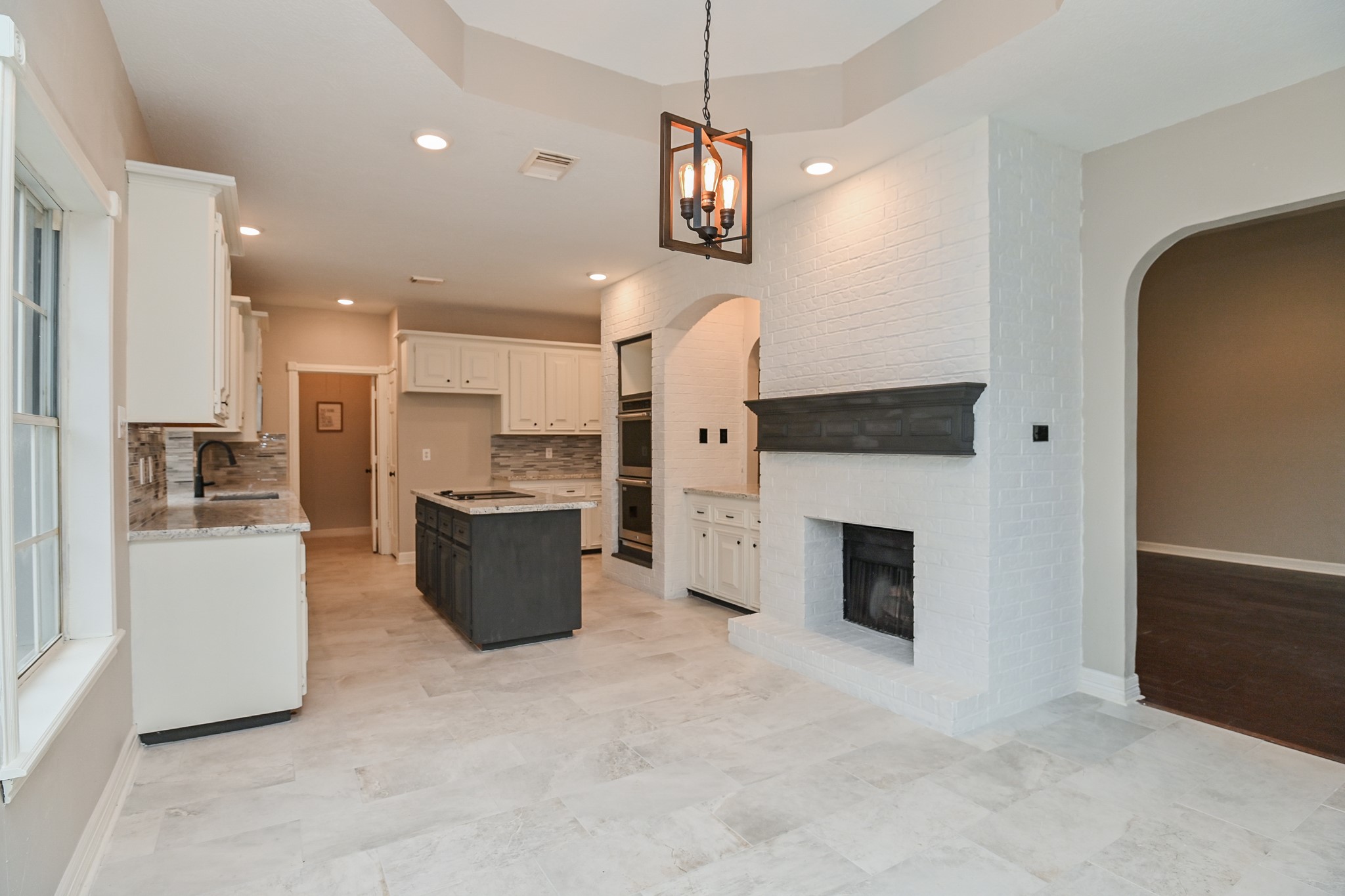 17910 Moss Point Drive Spring, TX 77379 - Photo 10 of 32 a large kitchen with a large counter top appliances and cabinets