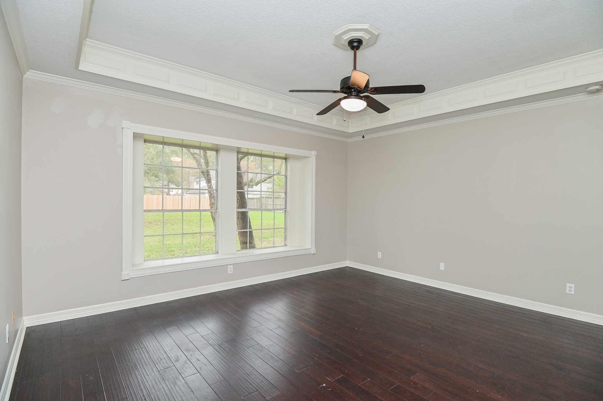 17910 Moss Point Drive Spring, TX 77379 - Photo 18 of 32 a view of an empty room with wooden floor and a window