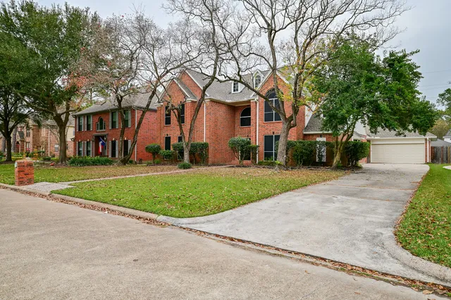 front view of house with a yard