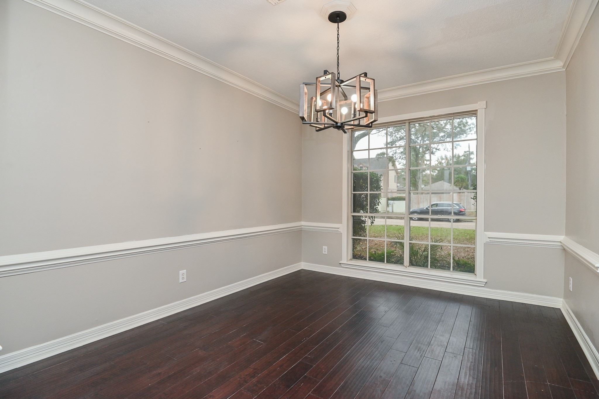 17910 Moss Point Drive Spring, TX 77379 - Photo 5 of 32 a view of a livingroom with a chandelier wooden floor and chandelier