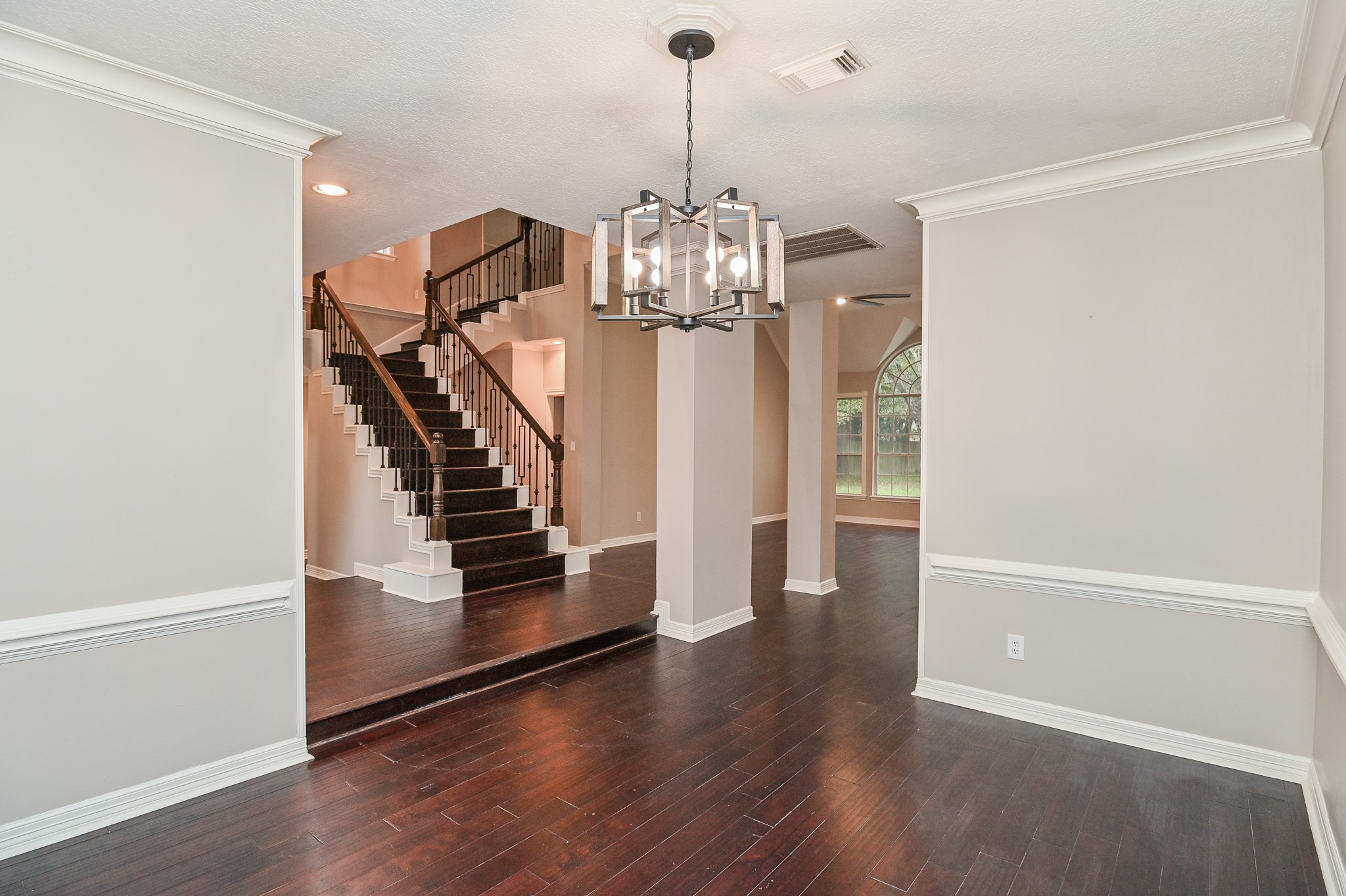 17910 Moss Point Drive Spring, TX 77379 - Photo 32 of 32 a view of a hallway with wooden floor and staircase