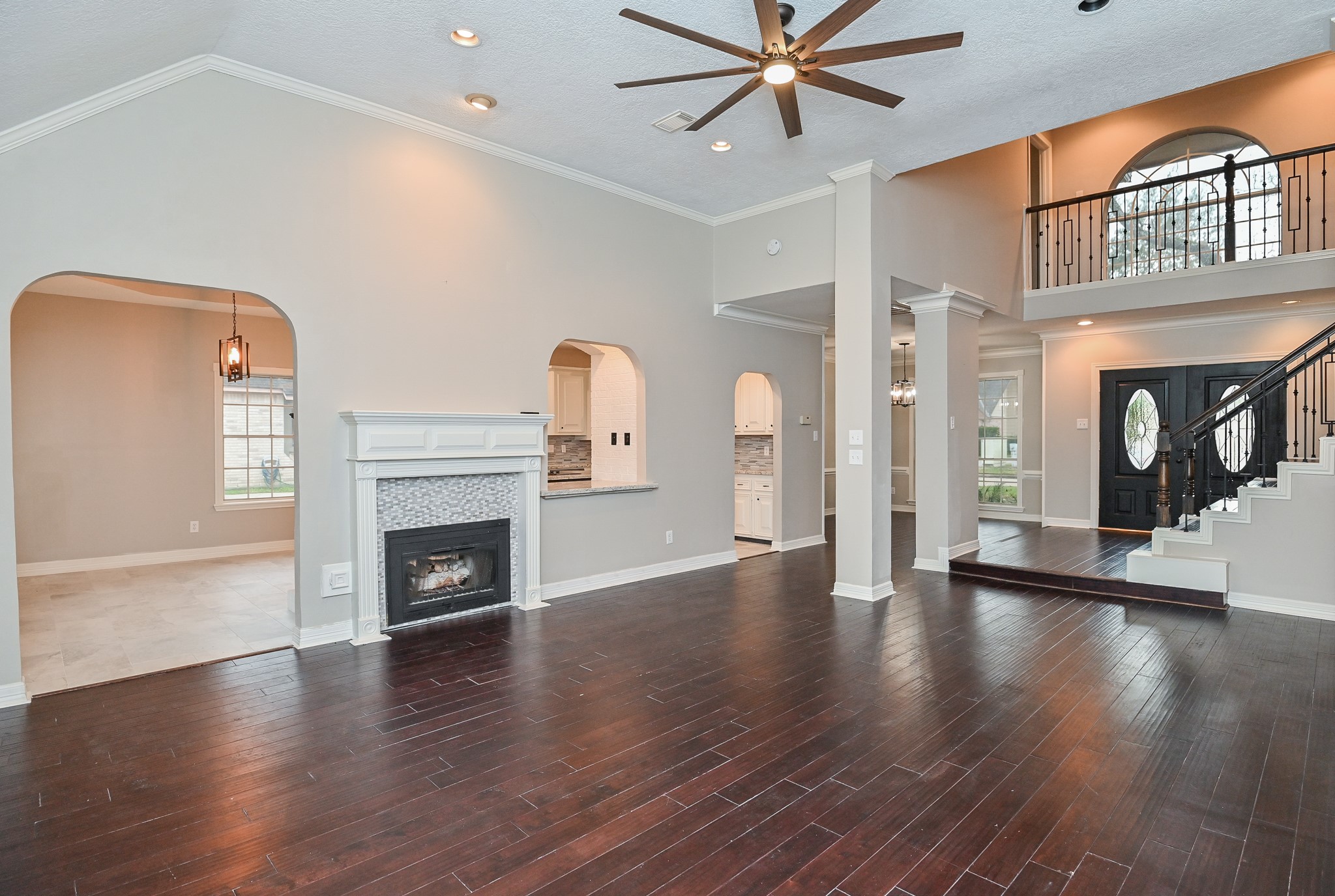 17910 Moss Point Drive Spring, TX 77379 - Photo 7 of 32 a view of an empty room with wooden floor fireplace and a window