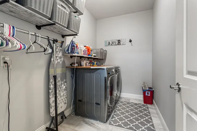 a workspace with furniture and a window