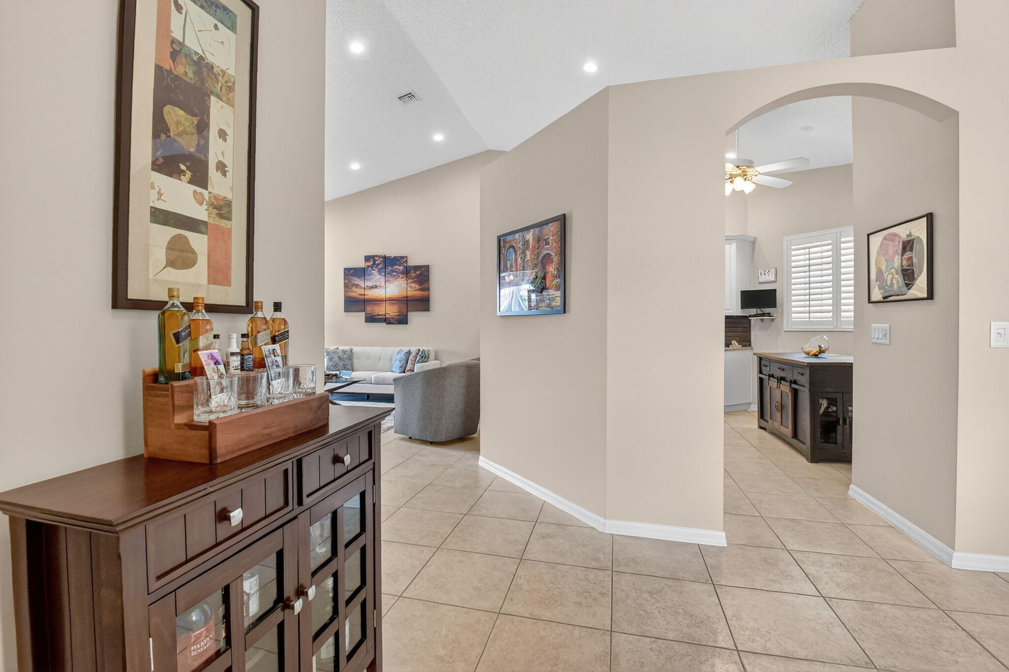 6210 Heliconia Road Delray Beach, FL 33484 - Photo 7 of 53 a view of kitchen with cabinets and window