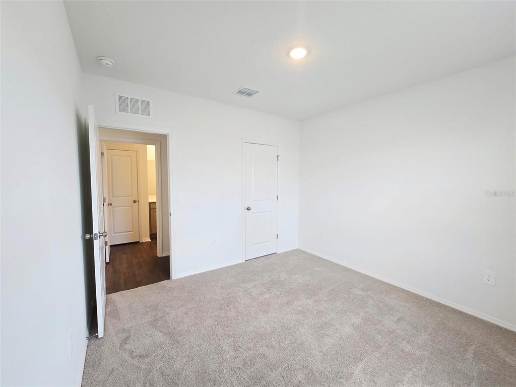 13031 Bluff Oak Way Parrish, FL 34219 - Photo 15 of 25 a view of an empty room