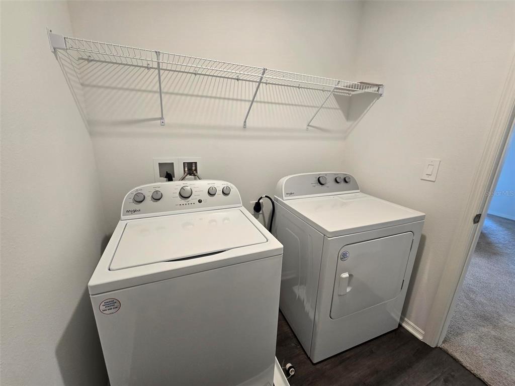 13031 Bluff Oak Way Parrish, FL 34219 - Photo 18 of 25 a utility room with dryer and washer