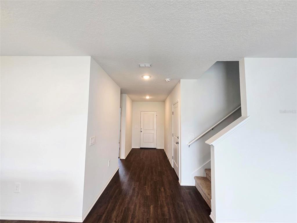 13031 Bluff Oak Way Parrish, FL 34219 - Photo 2 of 25 a view of entryway with wooden floor
