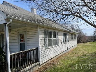 1368 Stone Mill Road Hurt, VA 24563 - Photo 2 of 17 a front view of a house with a yard