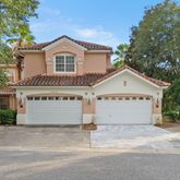 a view of a house with a garage and garage