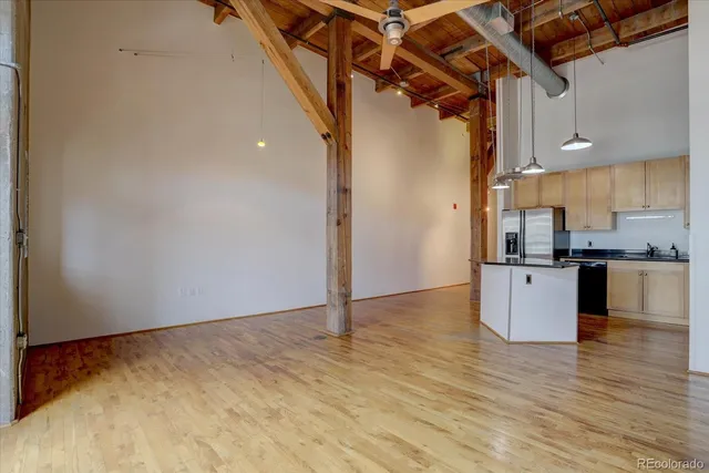 a view of a kitchen with a sink