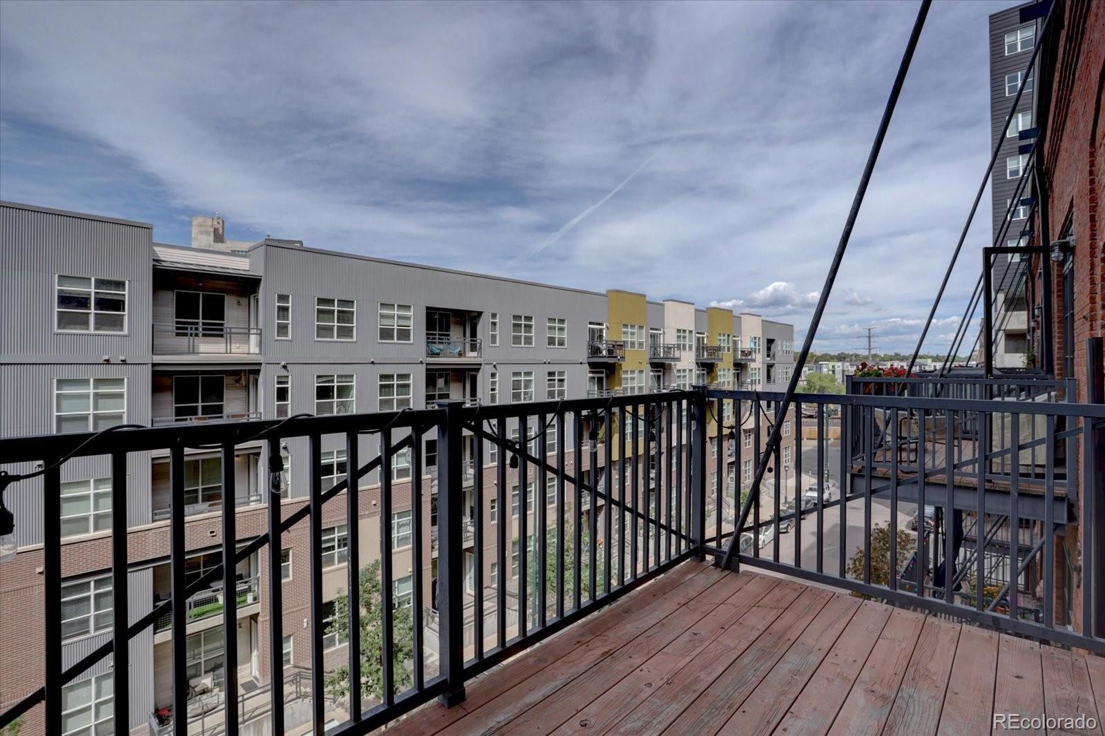 2960 Inca Street, Unit 416 Denver, CO 80202 - Photo 16 of 16 a view of city from a balcony