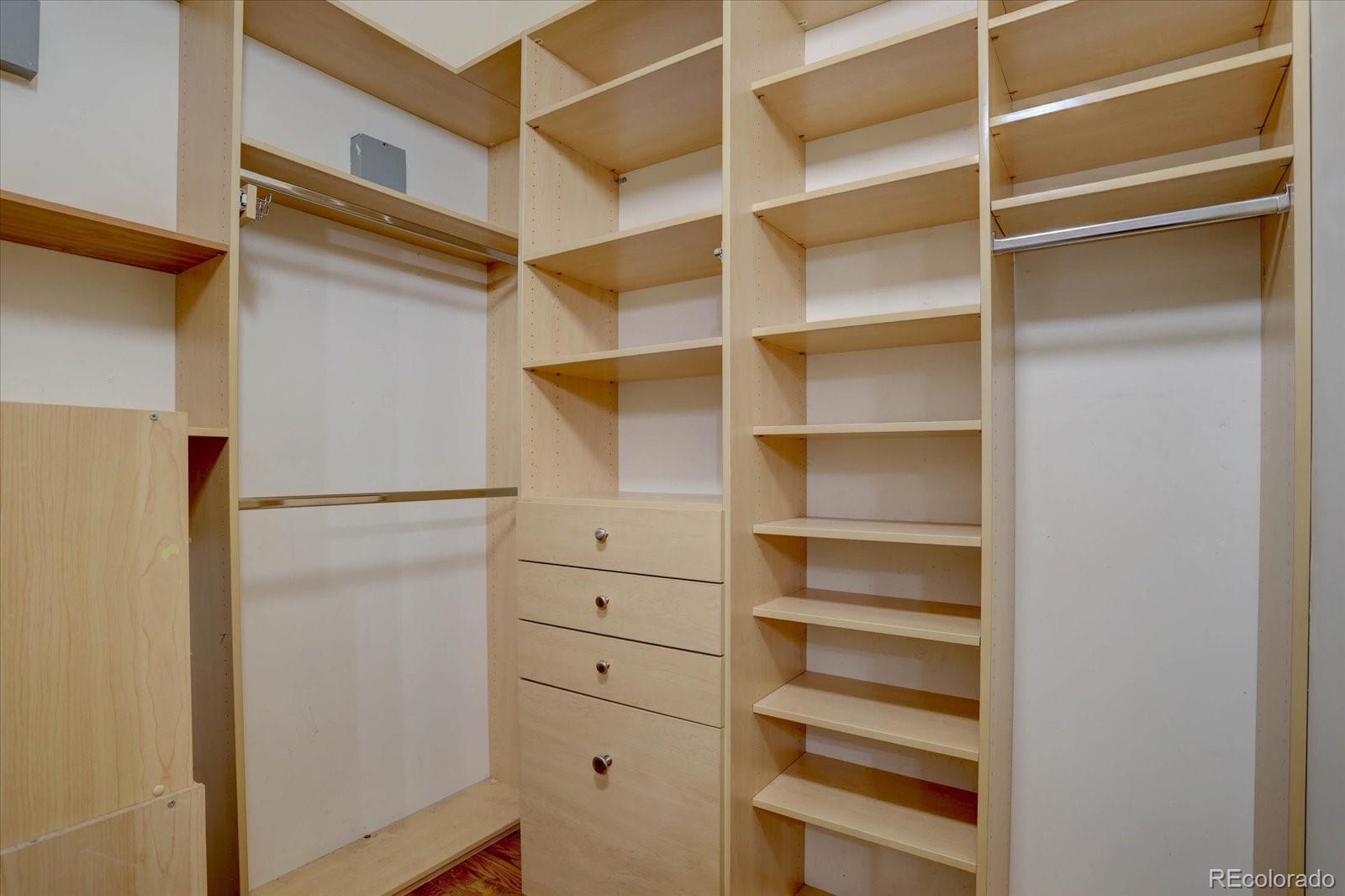 2960 Inca Street, Unit 416 Denver, CO 80202 - Photo 8 of 16 a view of walk in closet with empty racks