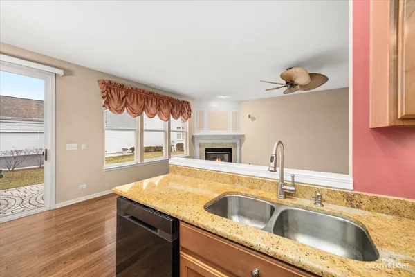 a kitchen with a sink and a window