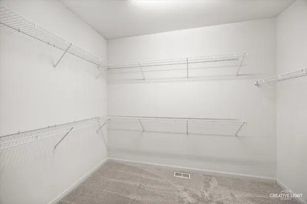 a view of a room with racks on the wall