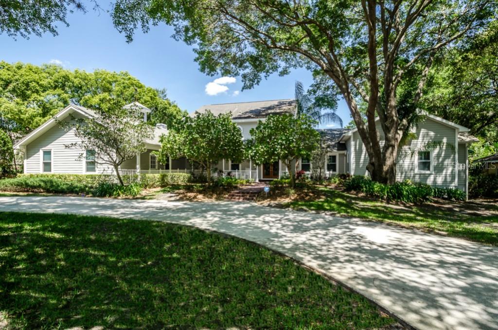 Bring your family to see this very special home... 5 bedrooms, 5 baths, over 5300 sq.ft. of living area, pool, spa, tennis court, cabana & outdoor kitchen, situated on over an acre of land in Safety Harbor!